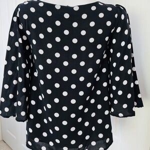 Chelsea & Theodore black & white polka dot blouse with bell sleeves. Size XS